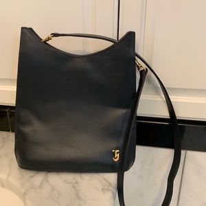 Navy leather crossbody. Lined interior & pocket